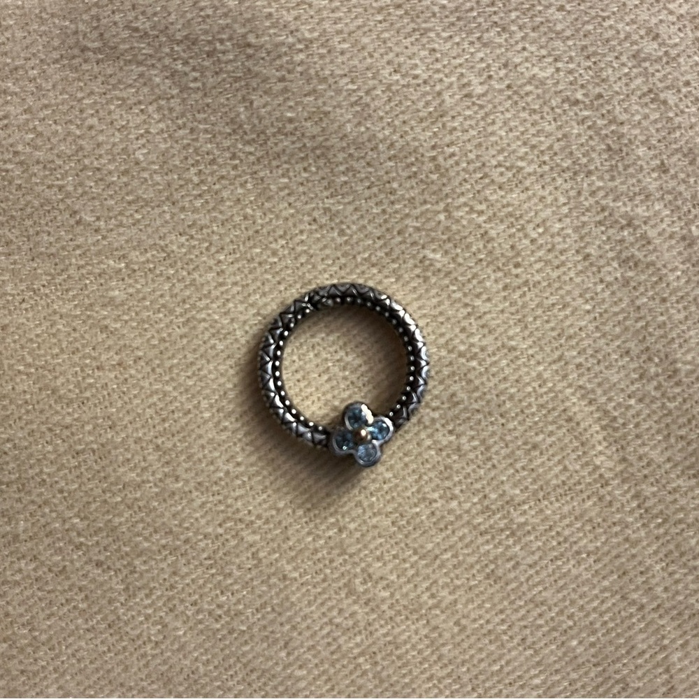 Barbara Bixby Connector circle ring with blue topaz and gold flower